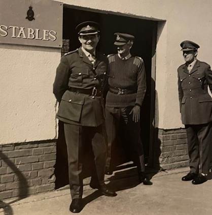 A picture containing text, person, military uniform, outdoor
Description automatically generated